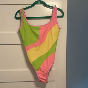 New, never worn LainSnow one piece bathing suit, size Large, sherbet color